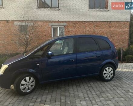 Синий Опель Мерива, объемом двигателя 1.69 л и пробегом 253 тыс. км за 3850 $, фото 3 на Automoto.ua