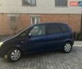 Синий Опель Мерива, объемом двигателя 1.69 л и пробегом 253 тыс. км за 3850 $, фото 3 на Automoto.ua
