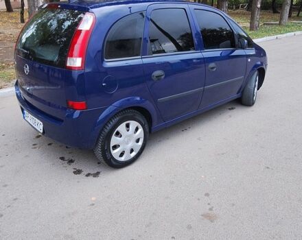 Синий Опель Мерива, объемом двигателя 1.6 л и пробегом 185 тыс. км за 4099 $, фото 6 на Automoto.ua