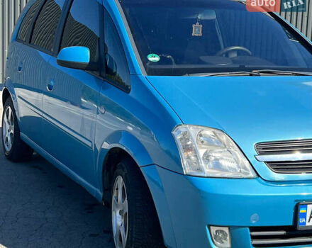 Синий Опель Мерива, объемом двигателя 1.6 л и пробегом 240 тыс. км за 3850 $, фото 8 на Automoto.ua