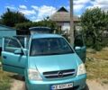 Синий Опель Мерива, объемом двигателя 1.6 л и пробегом 202 тыс. км за 4500 $, фото 1 на Automoto.ua