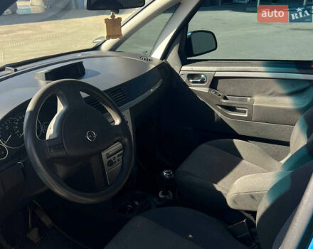 Синий Опель Мерива, объемом двигателя 1.6 л и пробегом 240 тыс. км за 3850 $, фото 18 на Automoto.ua