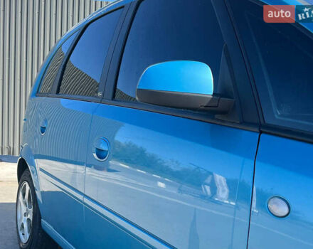 Синий Опель Мерива, объемом двигателя 1.6 л и пробегом 240 тыс. км за 3850 $, фото 10 на Automoto.ua