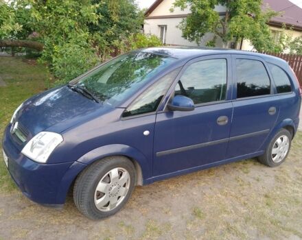 Синий Опель Мерива, объемом двигателя 1.6 л и пробегом 289 тыс. км за 3777 $, фото 1 на Automoto.ua