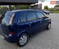Синий Опель Мерива, объемом двигателя 1.6 л и пробегом 280 тыс. км за 3800 $, фото 6 на Automoto.ua