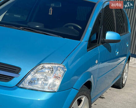 Синий Опель Мерива, объемом двигателя 1.6 л и пробегом 240 тыс. км за 3850 $, фото 5 на Automoto.ua