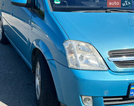 Синий Опель Мерива, объемом двигателя 1.6 л и пробегом 240 тыс. км за 3850 $, фото 4 на Automoto.ua