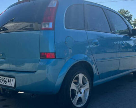 Синий Опель Мерива, объемом двигателя 1.6 л и пробегом 240 тыс. км за 3850 $, фото 11 на Automoto.ua