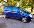 Синий Опель Мерива, объемом двигателя 1.7 л и пробегом 249 тыс. км за 3600 $, фото 1 на Automoto.ua