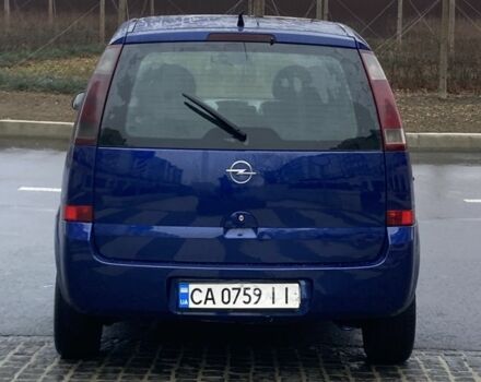 Синий Опель Мерива, объемом двигателя 1.3 л и пробегом 300 тыс. км за 2900 $, фото 7 на Automoto.ua
