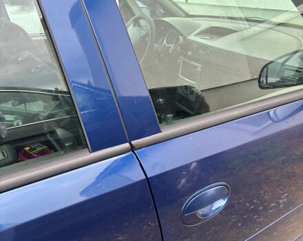 Синий Опель Мерива, объемом двигателя 1.36 л и пробегом 567 тыс. км за 2800 $, фото 1 на Automoto.ua