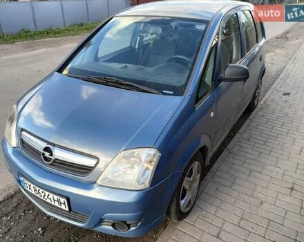 Синий Опель Мерива, объемом двигателя 1.25 л и пробегом 255 тыс. км за 4100 $, фото 1 на Automoto.ua