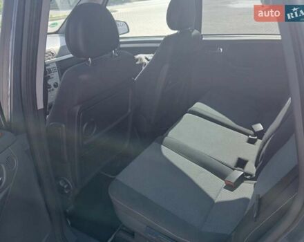 Синий Опель Мерива, объемом двигателя 1.36 л и пробегом 242 тыс. км за 4158 $, фото 2 на Automoto.ua