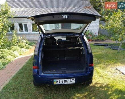 Синий Опель Мерива, объемом двигателя 1.6 л и пробегом 254 тыс. км за 4200 $, фото 4 на Automoto.ua