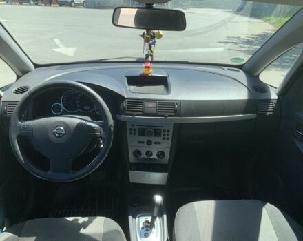 Синий Опель Мерива, объемом двигателя 1.6 л и пробегом 257 тыс. км за 4800 $, фото 5 на Automoto.ua