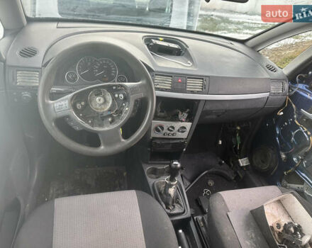 Синий Опель Мерива, объемом двигателя 1.6 л и пробегом 210 тыс. км за 2200 $, фото 4 на Automoto.ua