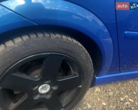 Синий Опель Мерива, объемом двигателя 1.6 л и пробегом 217 тыс. км за 5300 $, фото 12 на Automoto.ua