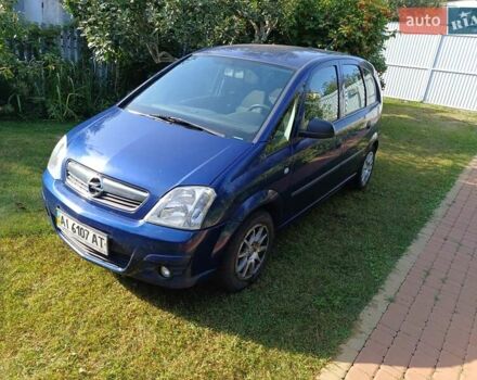 Синий Опель Мерива, объемом двигателя 1.6 л и пробегом 254 тыс. км за 4200 $, фото 1 на Automoto.ua