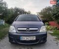 Синий Опель Мерива, объемом двигателя 1.6 л и пробегом 267 тыс. км за 2950 $, фото 1 на Automoto.ua
