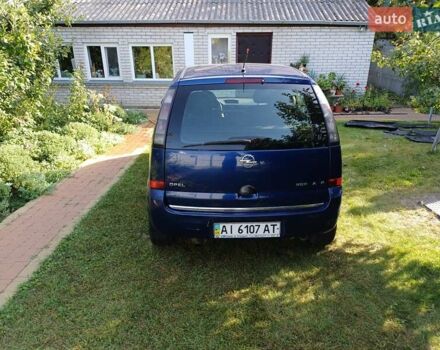 Синий Опель Мерива, объемом двигателя 1.6 л и пробегом 254 тыс. км за 4200 $, фото 3 на Automoto.ua