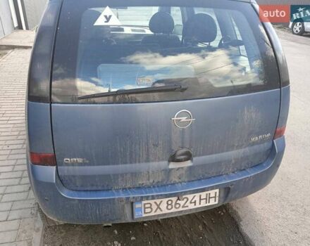 Синий Опель Мерива, объемом двигателя 1.25 л и пробегом 255 тыс. км за 4100 $, фото 4 на Automoto.ua