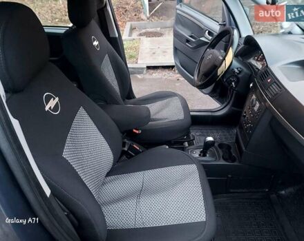 Синий Опель Мерива, объемом двигателя 1.6 л и пробегом 250 тыс. км за 4100 $, фото 25 на Automoto.ua