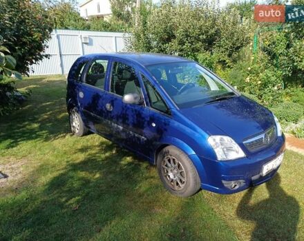 Синий Опель Мерива, объемом двигателя 1.6 л и пробегом 254 тыс. км за 4200 $, фото 2 на Automoto.ua