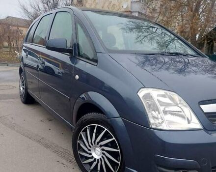 Синий Опель Мерива, объемом двигателя 1.6 л и пробегом 250 тыс. км за 4100 $, фото 1 на Automoto.ua