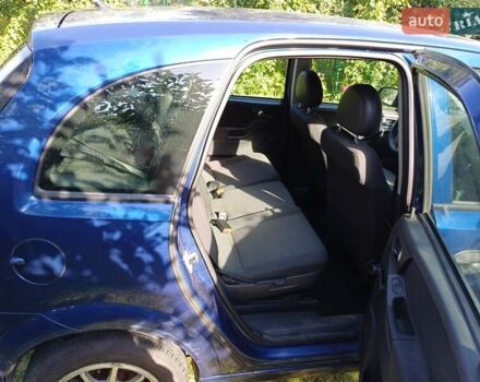 Синий Опель Мерива, объемом двигателя 1.6 л и пробегом 254 тыс. км за 4200 $, фото 8 на Automoto.ua