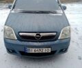 Синий Опель Мерива, объемом двигателя 1.6 л и пробегом 239 тыс. км за 4850 $, фото 1 на Automoto.ua