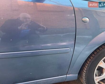 Синий Опель Мерива, объемом двигателя 1.8 л и пробегом 269 тыс. км за 3500 $, фото 9 на Automoto.ua