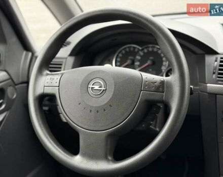 Синий Опель Мерива, объемом двигателя 1.6 л и пробегом 142 тыс. км за 3950 $, фото 69 на Automoto.ua
