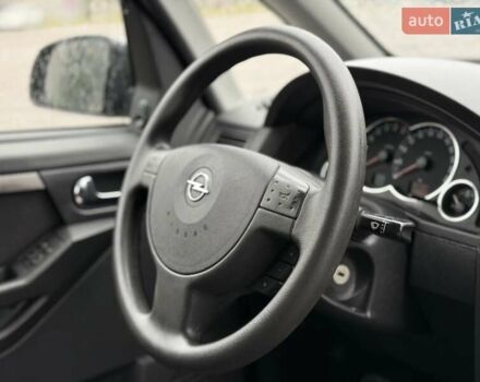 Синий Опель Мерива, объемом двигателя 1.6 л и пробегом 142 тыс. км за 3950 $, фото 44 на Automoto.ua