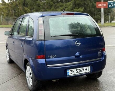 Синий Опель Мерива, объемом двигателя 1.6 л и пробегом 142 тыс. км за 3950 $, фото 27 на Automoto.ua