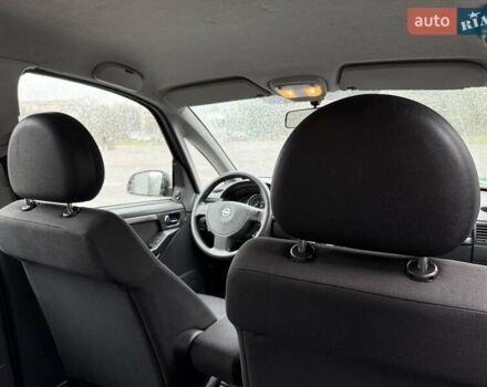 Синий Опель Мерива, объемом двигателя 1.6 л и пробегом 142 тыс. км за 3950 $, фото 50 на Automoto.ua