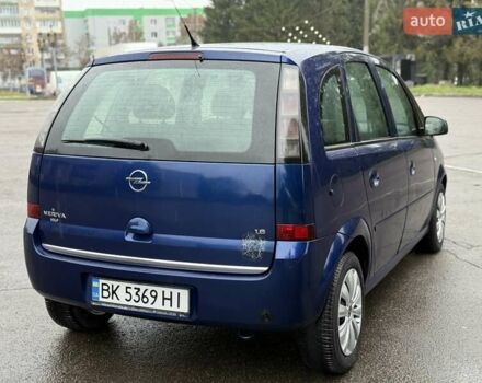 Синий Опель Мерива, объемом двигателя 1.6 л и пробегом 142 тыс. км за 3950 $, фото 19 на Automoto.ua