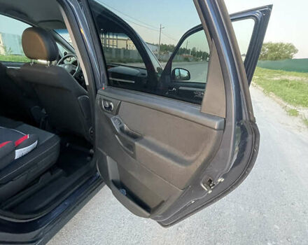 Синий Опель Мерива, объемом двигателя 1.69 л и пробегом 262 тыс. км за 3550 $, фото 24 на Automoto.ua