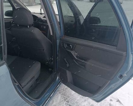 Синий Опель Мерива, объемом двигателя 1.6 л и пробегом 141 тыс. км за 4000 $, фото 5 на Automoto.ua