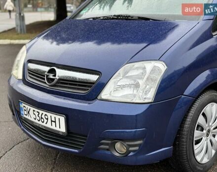 Синий Опель Мерива, объемом двигателя 1.6 л и пробегом 142 тыс. км за 3950 $, фото 4 на Automoto.ua