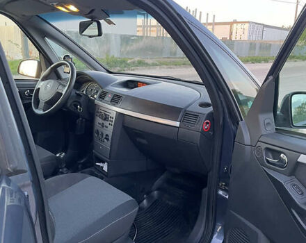 Синий Опель Мерива, объемом двигателя 1.69 л и пробегом 262 тыс. км за 3550 $, фото 26 на Automoto.ua