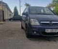 Синий Опель Мерива, объемом двигателя 1.6 л и пробегом 250 тыс. км за 3100 $, фото 1 на Automoto.ua