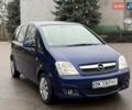 Синий Опель Мерива, объемом двигателя 1.6 л и пробегом 142 тыс. км за 3950 $, фото 13 на Automoto.ua