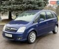 Синий Опель Мерива, объемом двигателя 1.6 л и пробегом 142 тыс. км за 3950 $, фото 2 на Automoto.ua