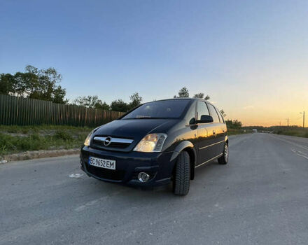 Синий Опель Мерива, объемом двигателя 1.69 л и пробегом 262 тыс. км за 3550 $, фото 4 на Automoto.ua