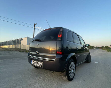 Синий Опель Мерива, объемом двигателя 1.69 л и пробегом 262 тыс. км за 3550 $, фото 2 на Automoto.ua