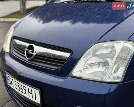 Синий Опель Мерива, объемом двигателя 1.6 л и пробегом 142 тыс. км за 3950 $, фото 5 на Automoto.ua