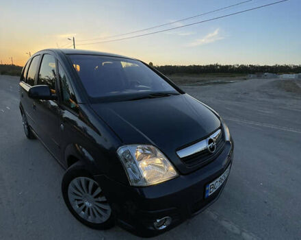 Синий Опель Мерива, объемом двигателя 1.69 л и пробегом 262 тыс. км за 3550 $, фото 8 на Automoto.ua