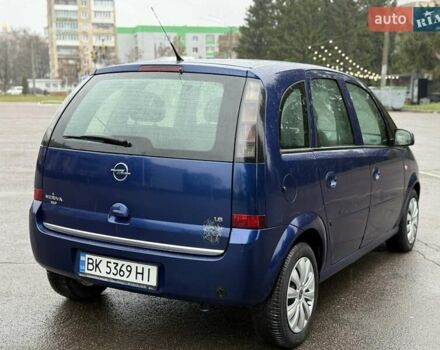 Синий Опель Мерива, объемом двигателя 1.6 л и пробегом 142 тыс. км за 3950 $, фото 20 на Automoto.ua
