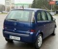 Синий Опель Мерива, объемом двигателя 1.6 л и пробегом 142 тыс. км за 3950 $, фото 20 на Automoto.ua