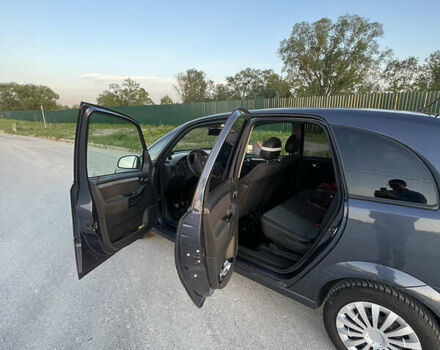 Синий Опель Мерива, объемом двигателя 1.69 л и пробегом 262 тыс. км за 3550 $, фото 14 на Automoto.ua